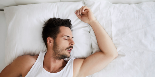 man asleep on his back with mouth open