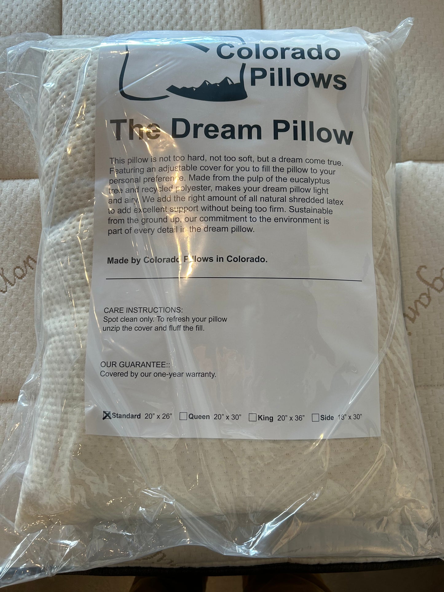 Packaged pillow with Colorado Pillows branding and product details.