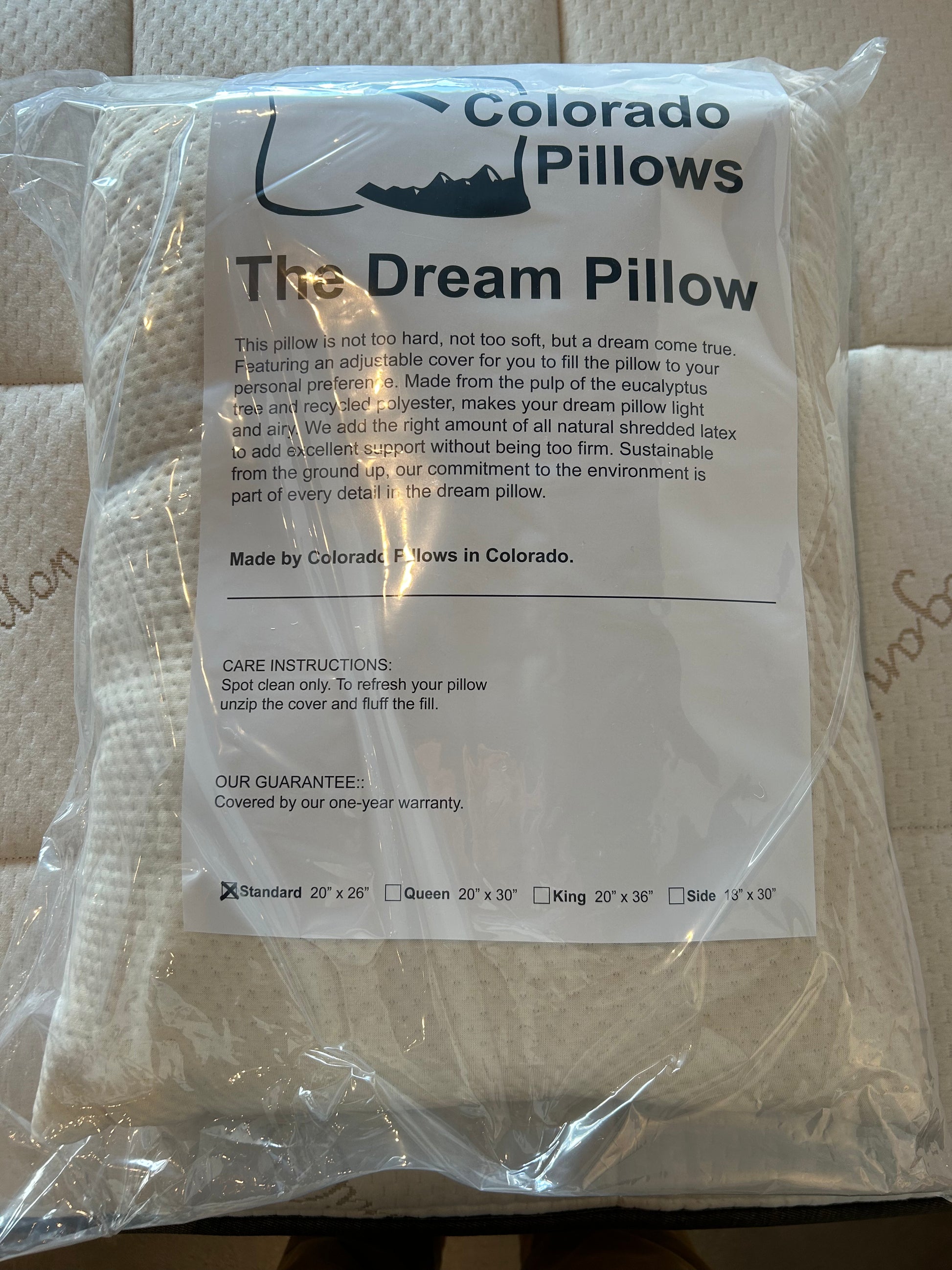 Packaged pillow with Colorado Pillows branding and product details.